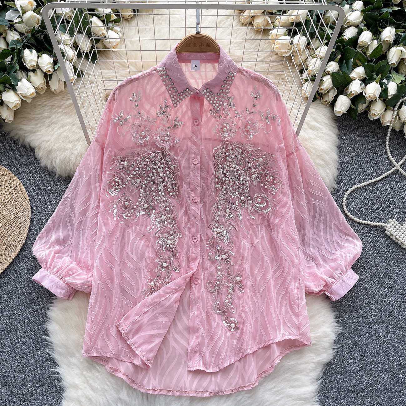 Camicia con bottoni lucidi da  - Quality Winter Clothing recensione e prezzo